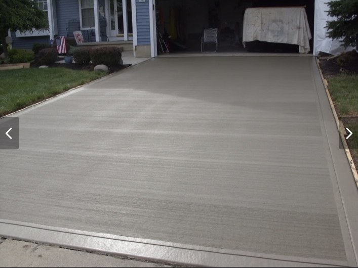Broom-finished concrete driveway